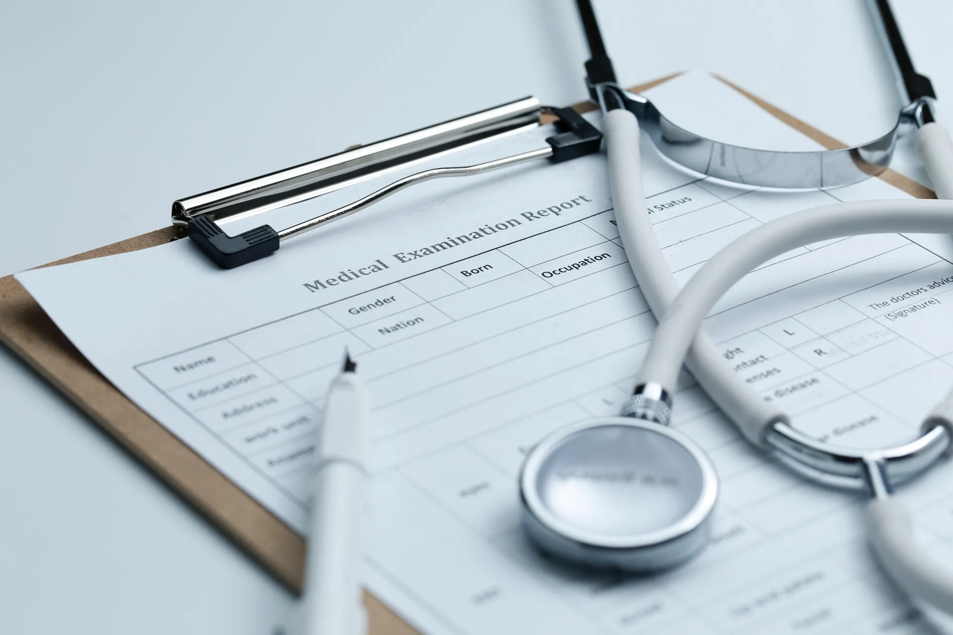 medical-examination-report-stethoscope-white-desktop;