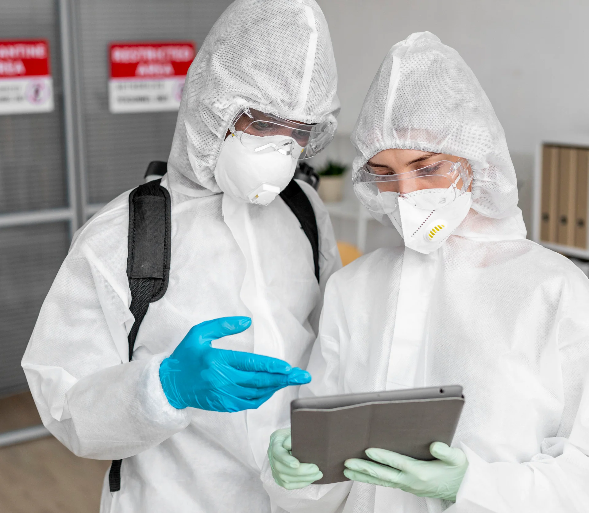 people-wearing-protective-equipment-disinfecting-dangerous-area;